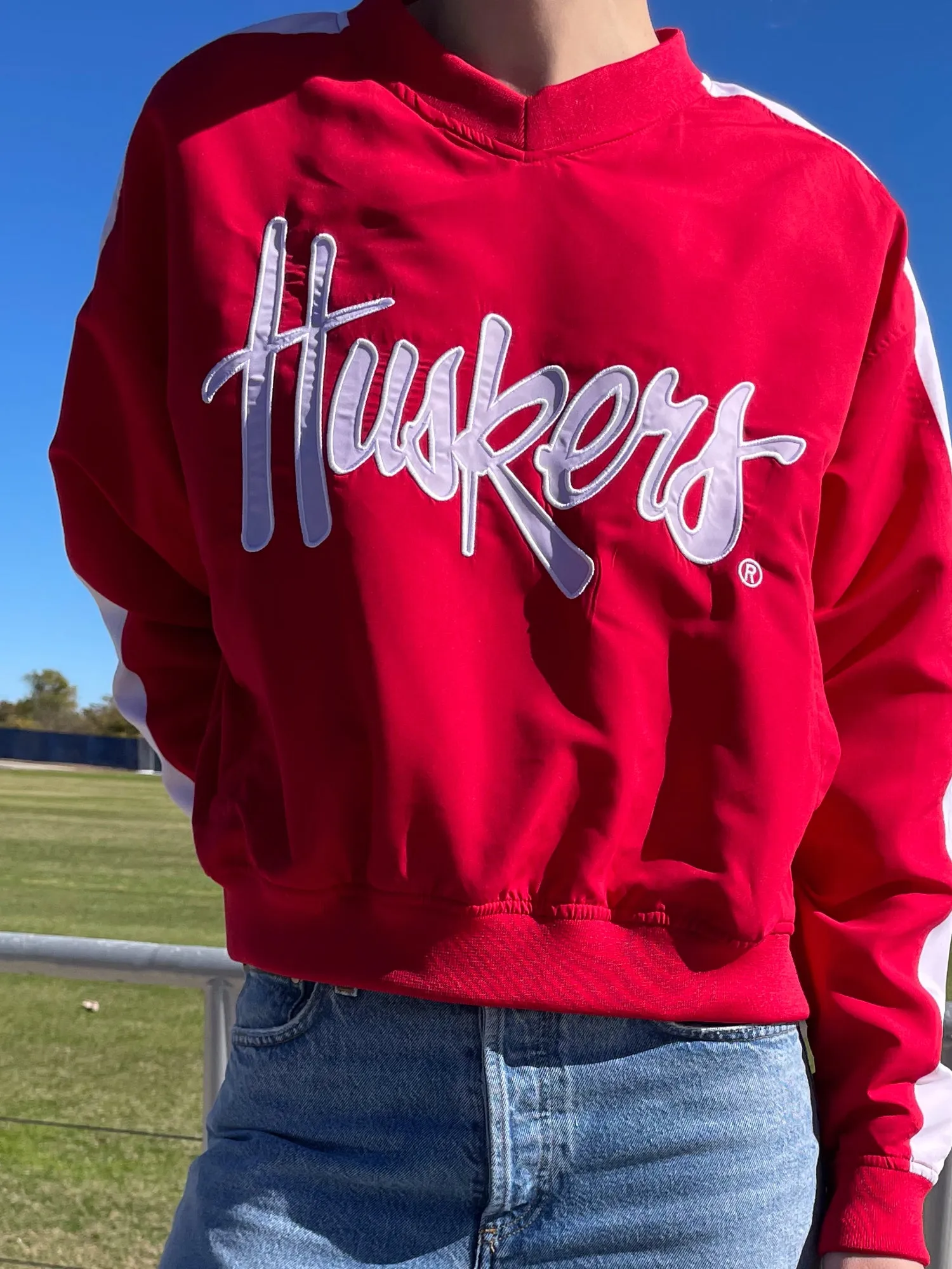 University of Nebraska - Women's Cropped V-Neck Windbreaker  - Red