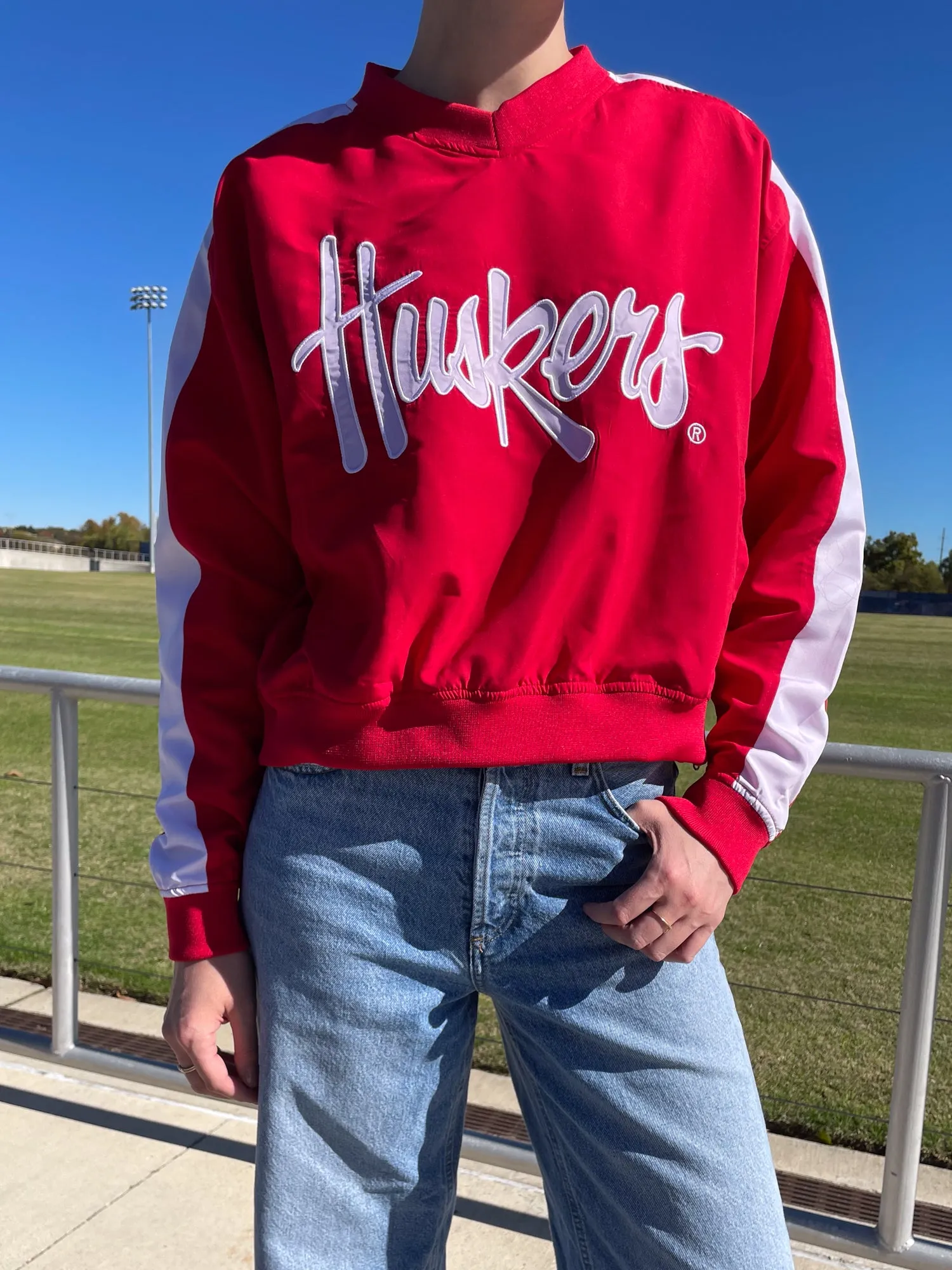 University of Nebraska - Women's Cropped V-Neck Windbreaker  - Red