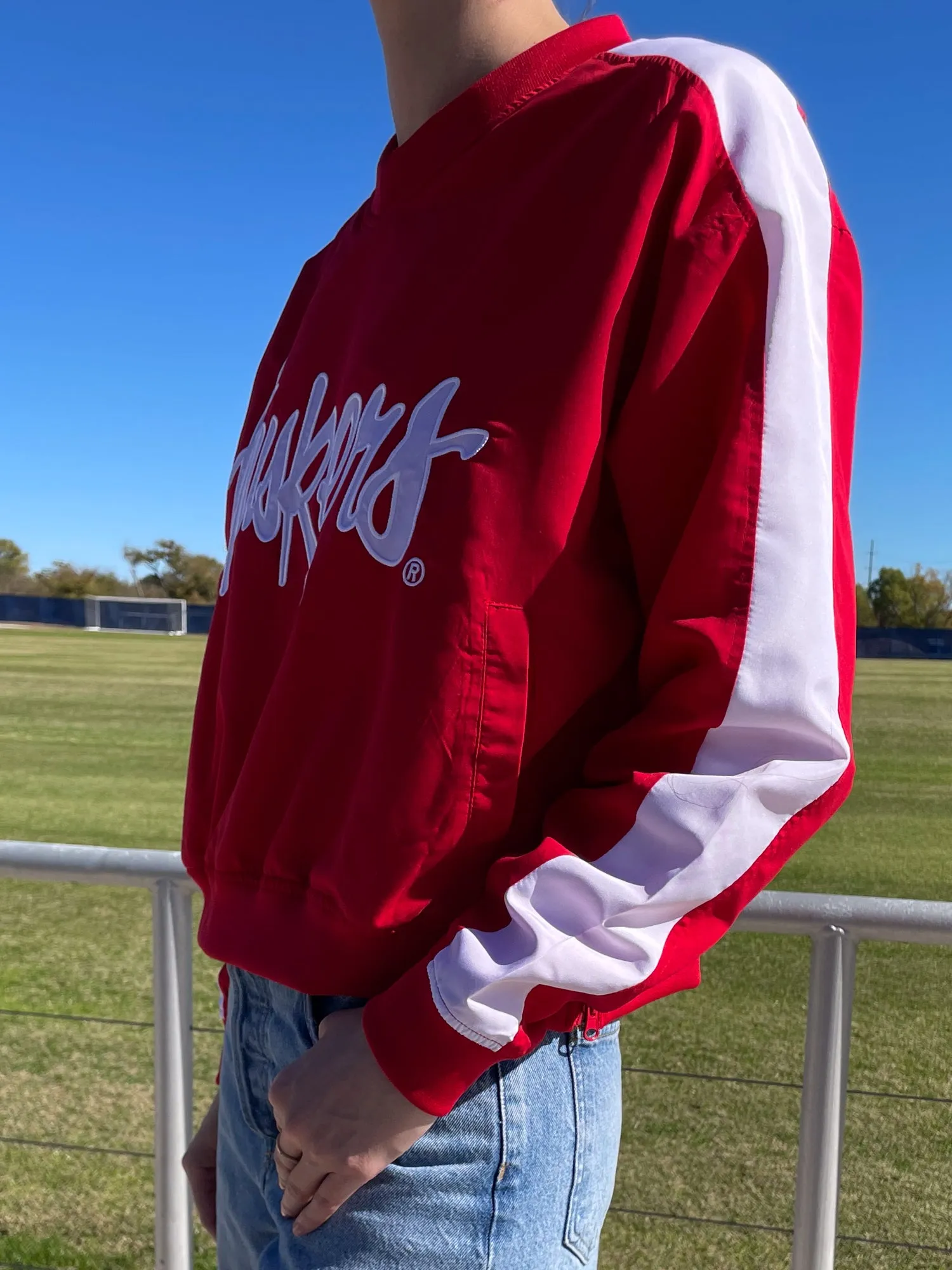 University of Nebraska - Women's Cropped V-Neck Windbreaker  - Red